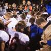 The parties included this image of Coach Kennedy, praying with the crowd after the homecoming game, in their joint appendix submitted to the Supreme Court.