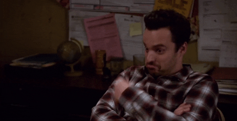 A man gestures as if to say "sure, fine."