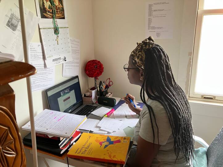 Sandra Maria Varela, an immigrant from Portugal, is studying English literacy on Zoom with her teacher, Alice Levine. Varela's goal is to pass the Massachusetts exam that certifies nursing assistants. She passed the clinical part of the exam on the first try, but has not yet passed the multiple-choice test given in English.