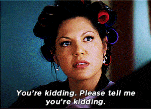 A woman says "You're kidding. Please tell me you're kidding."
