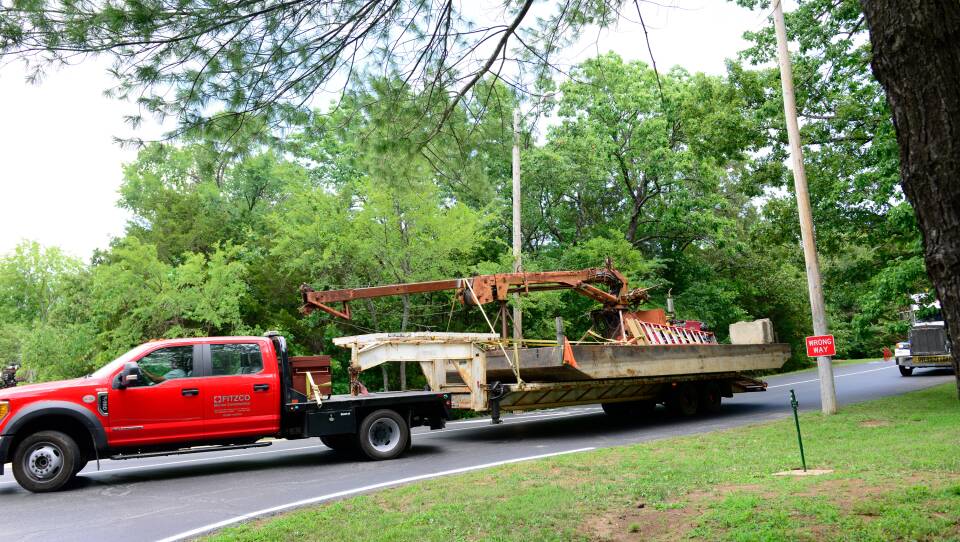 Salvage equipment to remove the capsized duck boat is transported to a staging area at Table Rock Lake near Branson, Mo. The U.S. Coast Guard oversaw the operation on Monday.