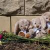 Items are left at a makeshift memorial at the entrance of the Covenant School after the mass shooting.
