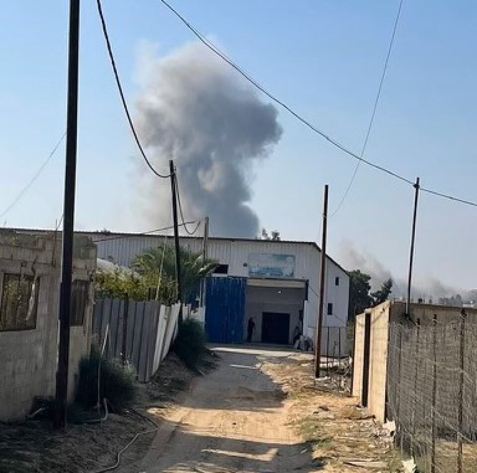 A plume of smoke over the site where an airstrike landed in Gaza, Thursday, October 26, 2023