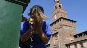 A woman cools off at a fountain at the Sforza Castle in Milan, Italy, on July 13. You can do a lot to look out for those who are at higher risk of heat-related illness.