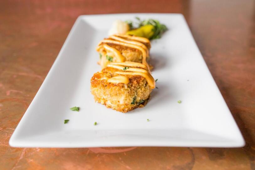 Bacon-and-crab cakes with spicy aioli at the Hangover Pub in Worcester.