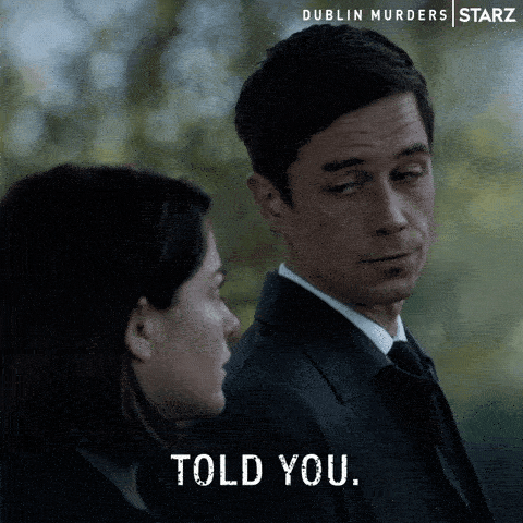 A man turns to a woman next to him and says "told you."