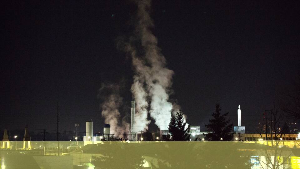 Plants like this Darigold dairy processing facility in Portland, Ore., may see higher energy prices under a cap-and-trade plan to limit greenhouse gas emissions.