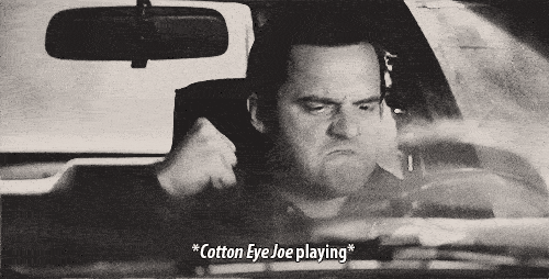 A man fist bumps to the song "Cotton Eye Joe"