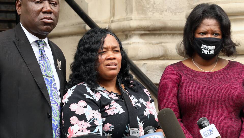 Breonna Taylor's mother, Tamika Palmer, says the justice system failed her daughter, an emergency medical technician who was shot and killed by police in her own apartment in March. Palmer released a statement through her sister Friday, after a grand jury declined to level any charges directly related to Taylor's death. She is seen here in August, speaking outside Louisville City Hall.