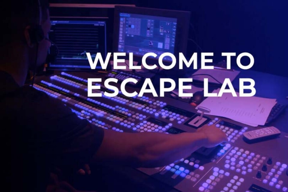 Escape Lab banner with an engineer in front of a production work station