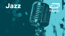 A light green old fashioned microphone on a dark green background with the words "GBH Music" and "jazz" written at the top.