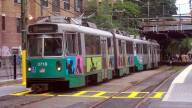 1024px-Outbound_Green_Line_train_leaving_Fenway_station_August_2005.jpg