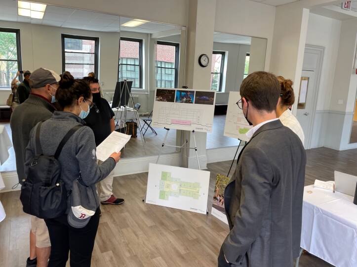 Community members look at developer proposal for Blessed Sacrament church