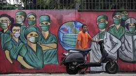 APTOPIX Virus Outbreak Indonesia