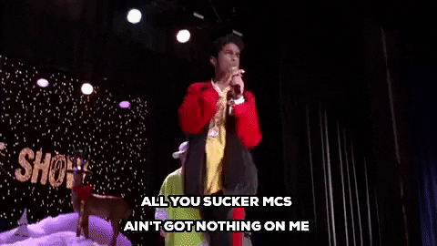 A man raps "All you sucker mcs ain't got nothing on me."