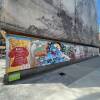 a mural in Boston's Chinatown neighborhood depicts a series of mythical creatures