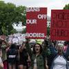 Abortion-rights demonstrators yell as they walk down Constitution Avenue during the Bans Off Our Bodies March on Saturday in Washington, D.C.