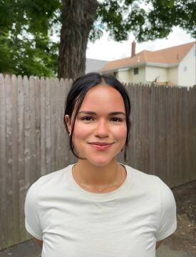 A young woman in a white T-shirt