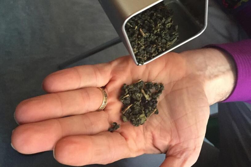 Oolong tea leaves in Hillel Bromberg's palm