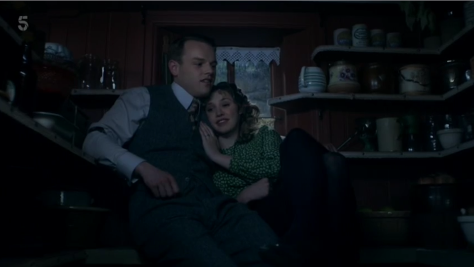 Tristan and Maggie have a cuddle in the pantry.
