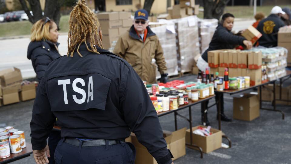 A TSA employee visits a food pantry for government workers affected by the federal shutdown, in Baltimore.