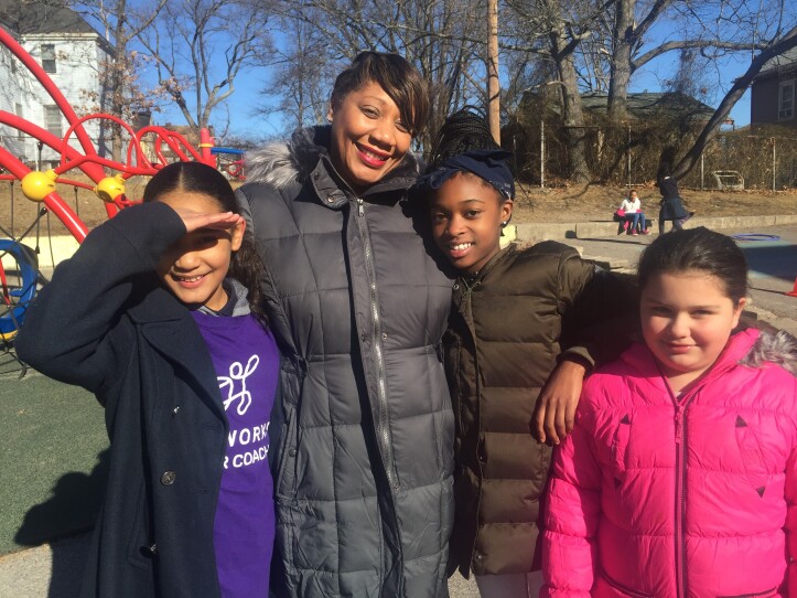 Chittick Elementary School students and their principal on the playground