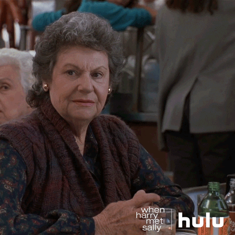 A woman says "I'll have what she's having."