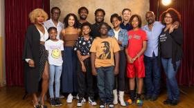 The cast of "Joe Turner's Come and Gone" stand for a photo at Boston's Huntington Theatre