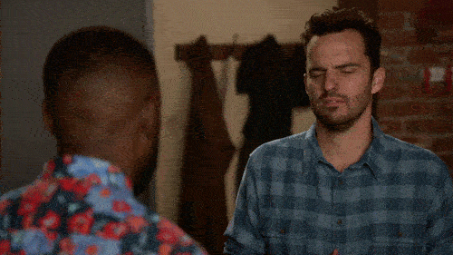 A man reacts with grumpy confusion