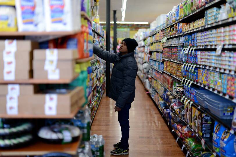Anwar shops for groceries in Dorchester.