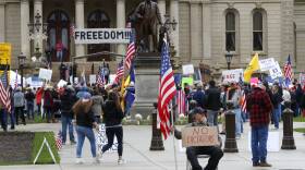 Virus Outbreak Protests