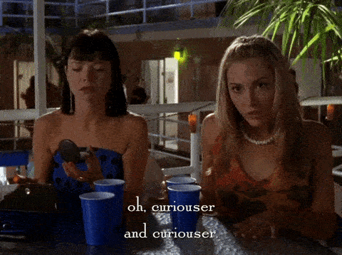 A young woman says "oh, curiouser and curiouser."