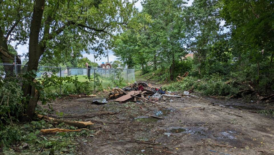 Pile of debris behind the Centralville Dog Park