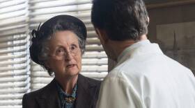 Miss Higgins reacts in shock