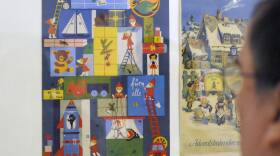 A visitor looks at an Advent calendar from 1966 of the former East Germany at a 2008 museum exhibit in Leipzig.