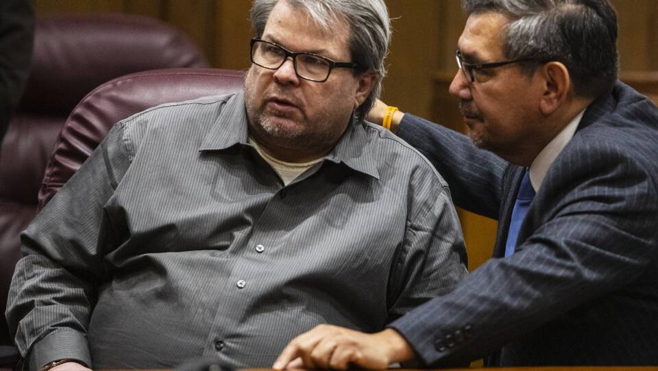 Jason Dalton talks with his defense attorney Eusebio Solis moments before pleading guilty to six counts of murder and other charges on Monday, in Kalamazoo, Mich. Opening statements in the trial were scheduled to begin Tuesday.