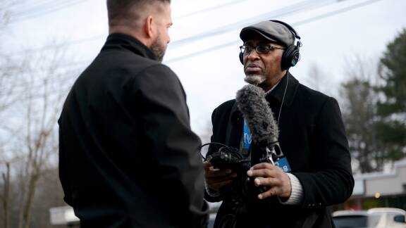 GBH Investigave Reporter Phillip Martin in the field.