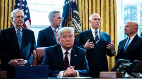 President Trump Signs Coronavirus Stimulus Bill In The Oval Office