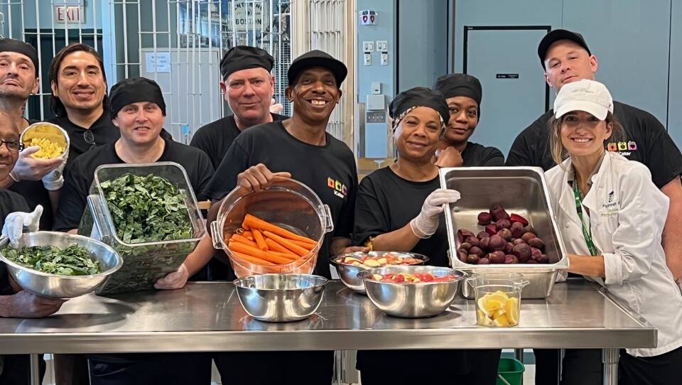 Trainees with fresh vegetables.jpg