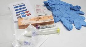 A drug overdose rescue kit is pictured in Buffalo, N.Y. The Biden administration plans to increase access to clean needles, fentanyl test strips and naloxone to combat drug overdose deaths.