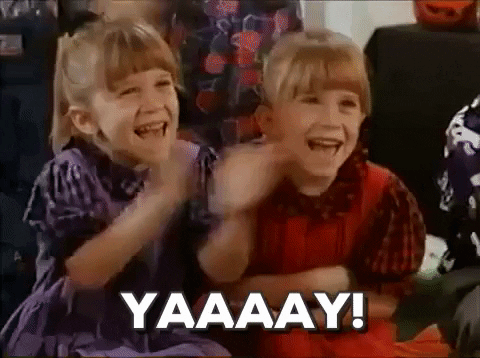 Two girls clap and say "Yay!"