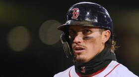 Closeup on Jarren Duran in his Red Sox uniform and helmet