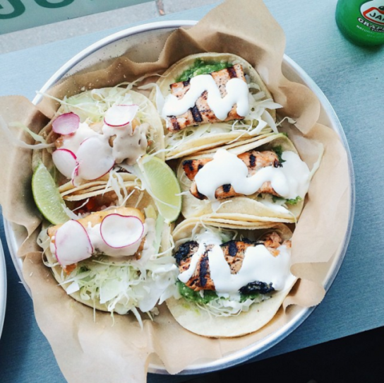 The Grilled Salmon Tacos at Dorado Tacos.