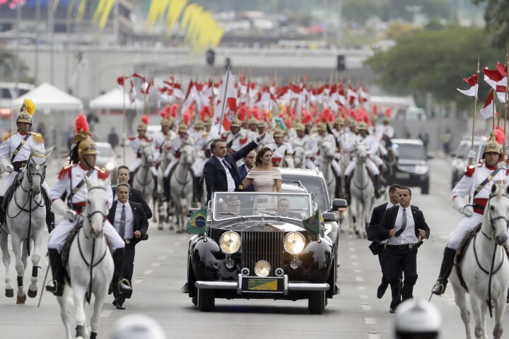 Image 1: Brazilian President Bolsanaro rides in inaugural parade.