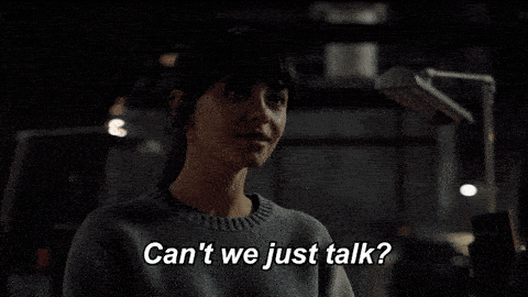 A woman asks "can't we just talk?"