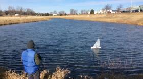 Thomas Germanson sails a radio-controlled model yacht in early December in Madison, Wis.