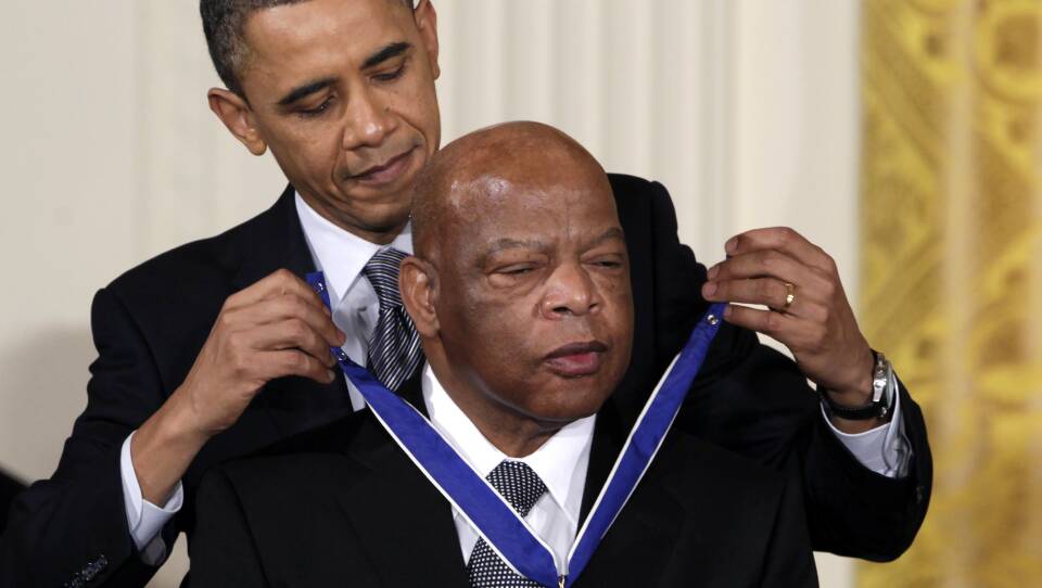 President Barack Obama presents a 2010 Presidential Medal of Freedom to U.S. Rep. John Lewis, D-Ga., during a ceremony in the East Room of the White House in Washington. The civil rights giant died Friday.