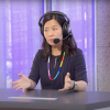 Mayor Michelle Wu gestures with her hands as she speaks during a radio program.
