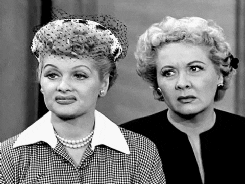 Two women make faces that say "Hmmm maybe?"