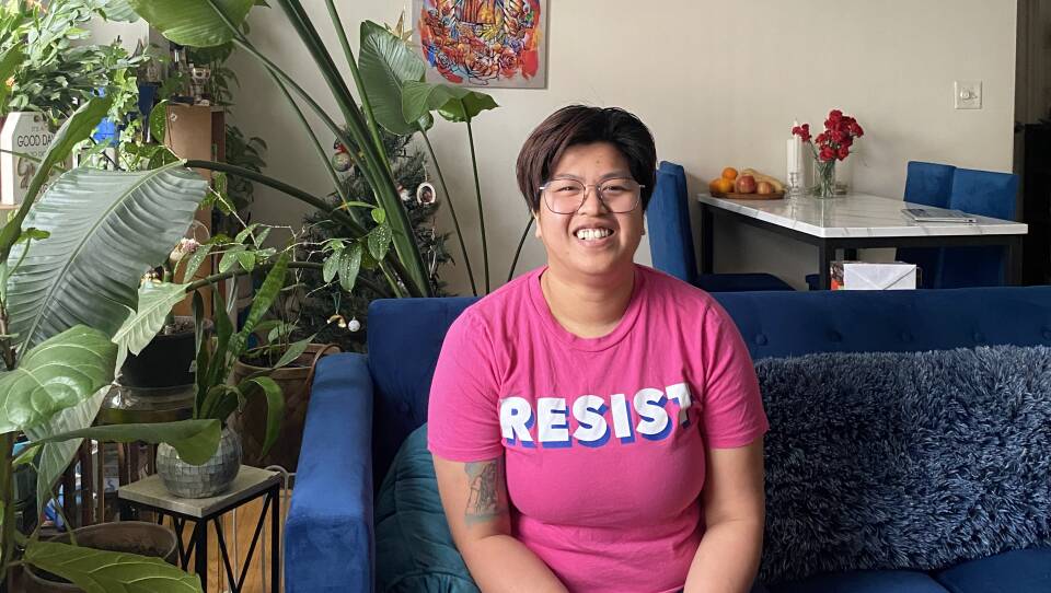 Worcester City Councilor Thu Nguyen, sitting in their home.